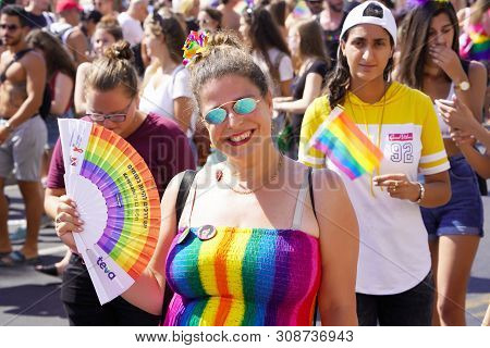 The Annual Parade Lgbt. Portrait Of Woman Lesbian In The Gay Pride Parade. Parade Of Tolerance. Rain