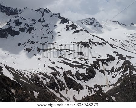 Beautiful View Of The Melting Snows Of Mount Cheget In Summer