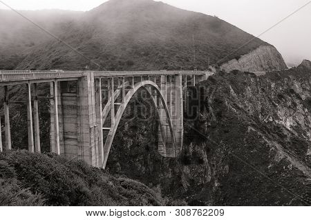 A Black And White Moody Shot Of Bixby Bridge On The Big Sur Coastal Highway