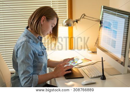 Graphic Designer Sitting At Work. Illustrator. Web Designer. Freelancer