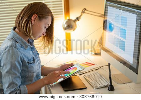 Graphic Designer Sitting At Work. Illustrator. Web Designer. Freelancer