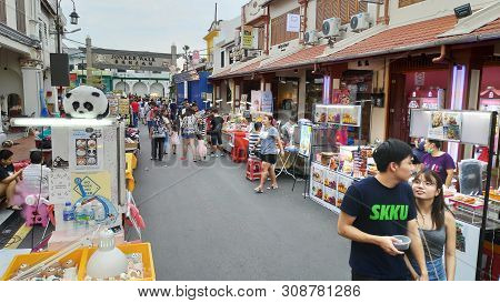 Melaka, Malaysia - 25 Jun, 2019: People Enjoy The Local Food At Night Market Located In Jonker Stree