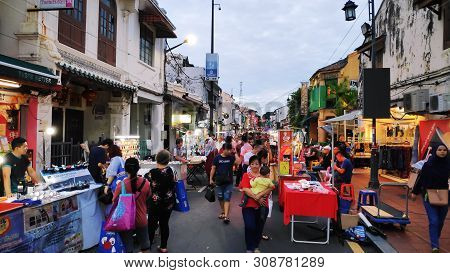Melaka, Malaysia - 25 Jun, 2019: People Enjoy The Local Food At Night Market Located In Jonker Stree