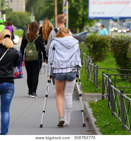Girl On Crutches, Prospekt Bolshevikov Saint-petersburg Russia September 2017