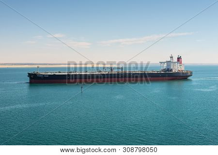 Suez, Egypt - November 5, 2017: Crude Oil Tanker Phoenix Vigor Vessel Passing The New Suez Canal Nea