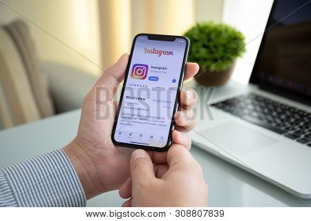 Alushta, Russia - October 9, 2018: Man Hand Holding Iphone X With Social Networking Service Instagra