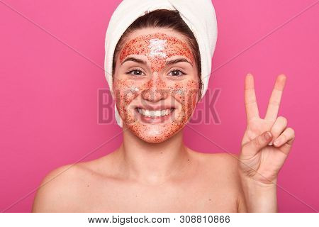 Portrait Of Cheerful Positive Woman Posing Isolated Over Pink Background In Studio, Being Naked, Hav