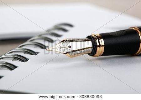 Fountain Pen On The Notepad On A Table  Closeup