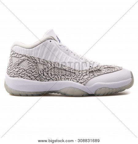 Vienna, Austria - August 25, 2017: Nike Air Jordan 11 Retro Low White Sneaker On White Background.