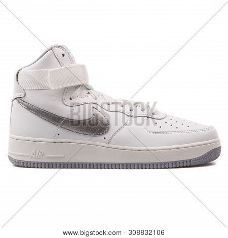 Vienna, Austria - August 25, 2017: Nike Air Force 1 High Retro Qs White Sneaker On White Background.