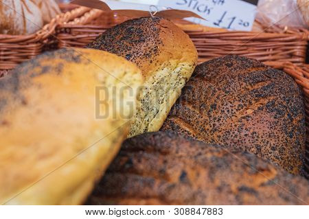 Chester, Uk - 26th June 2019: Freshly Baked Crusty Poppy Seed Bread On Display At A Local Market In 