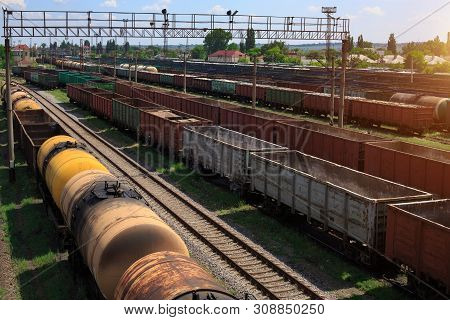 Freight Trains On City Cargo Terminal. Railways In Train Parking. Arain Arrived At The Station. Carg