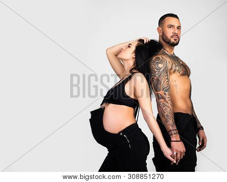 Quality Of Life Beginning With Pregnancy Care And Family Planning. Family Couple Expacting A Child. 