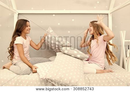 Soulmates Girls Having Fun Sleepover Party. Girls Happy Friends With Cute Pillows. Pillow Fight Paja