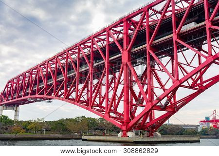 Red Minato Bridge, Double-deck Truss Bridge In Osaka, Japan. Upper Is Hanshin Expressway And Lower I