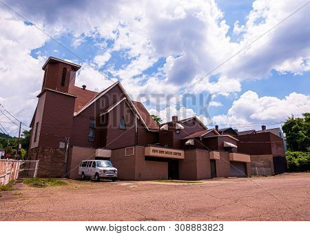 Braddock, Pennsylvania, Usa 6/29/2019 The New Hope Baptist Church Multi Center In Summer. Formerly A