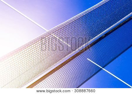 Blue Table Tennis Or Ping Pong. Close-up Ping-pong Net. Close Up Ping Pong Net And Line.