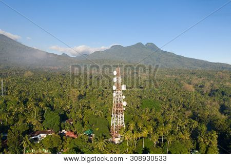 Telecommunication Tower, Communication Antenna On Camiguin Island, Philippines. Repeaters On A Metal