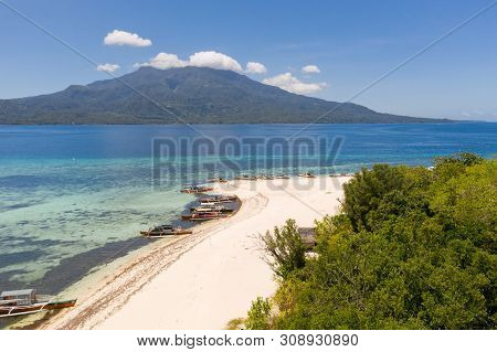White Sandy Beach On The Island Of Mantigue, Philippines. View Of The Island Camiguin. White Sand Be