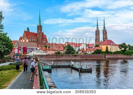 Wroclaw, Poland - June 21, 2019: Street View With Ostrow Tumski Island, Odra Or Oder River And Cathe