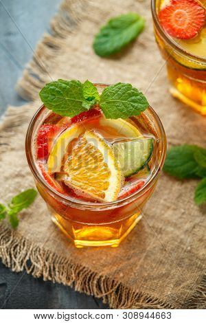 Refreshing Pimms Cocktail With Fruit And Vegetables.