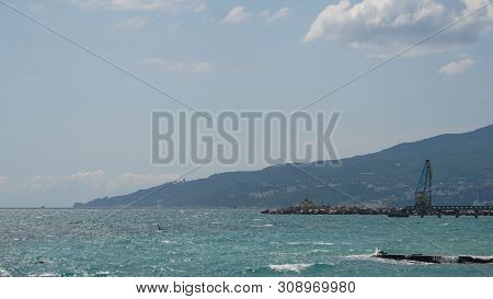 Panorama Of Embankment, Sea Coast Landscape, Breackwater In The Crimea