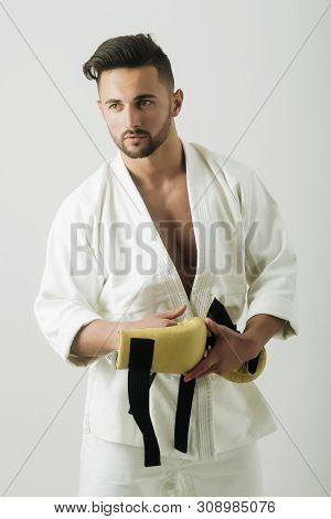 Sexy Athlete, Karatek With Black Belt. Strength And Attractiv, Perfect Guy On White Background. Kimo