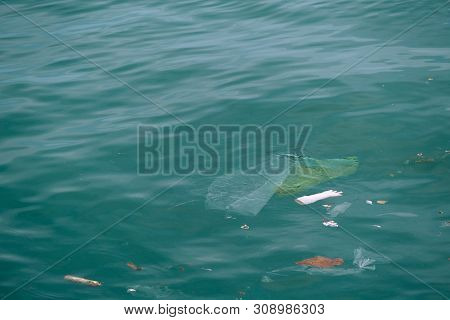 Trash, Plastic, Garbage, Bottle... Environmental Pollution On The Beach. Royalty High-quality Free S