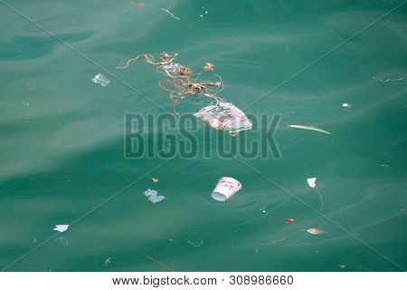 Trash, Plastic, Garbage, Bottle... Environmental Pollution On The Beach. Royalty High-quality Free S