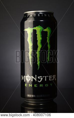 Ottawa, On, Canada, February 6, 2021: Can Of Monster Energy Drink On A Dark Gradient Background.