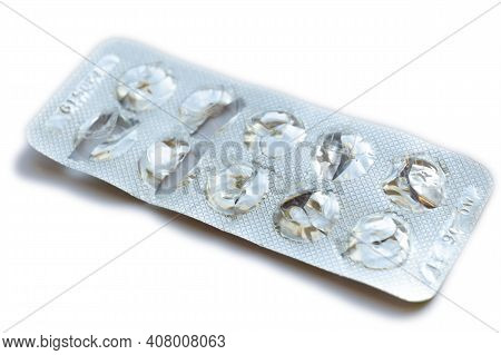Blank Blister Pack On Isolated White Background. Blister Pack Without Pills. Crumpled Blister Pack.