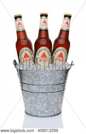 IRVINE, CA - MAY 28, 2014: Bass Pale Ale Bottles in ice bucket. The Bass Brewery was founded in 1777 by William Bass, in Trent, England is now owned by Anheuser-Busch InBev.