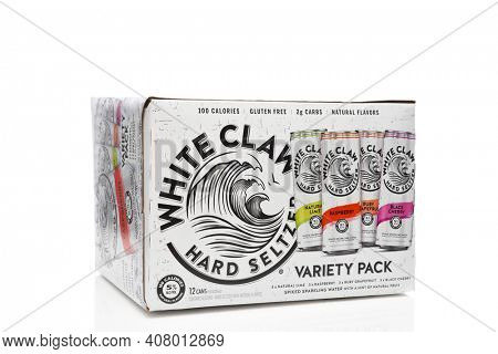 IRVINE, CALIFORNIA - 03 DEC 2019: A 12 can pack of White Claw Hard Seltzer on white with reflection.