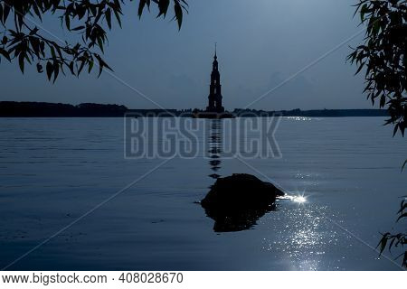 The Bell Tower Of The Orthodox Church, Which Was Surrounded By Water As A Result Of The Construction