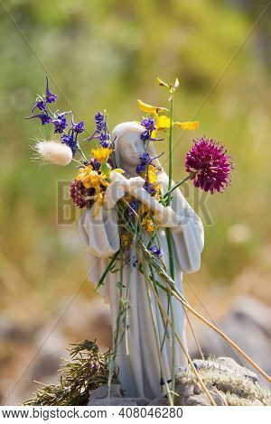 A Small Statue Of Mary That Overlooks The Sea From High Up On The Path Of The Gods On The Amalfi Coa