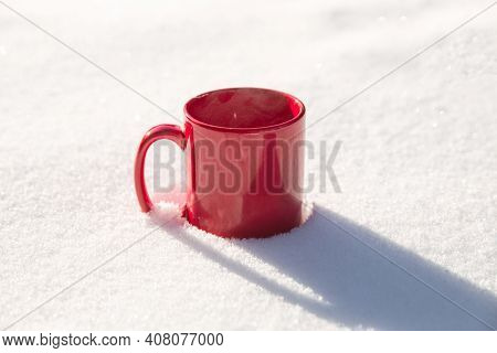 Steaming Cup Of Hot Coffee, Tea Or Chocolatemilk In The Cold Fresh White Snow, Winter, Cozy, Drink, 
