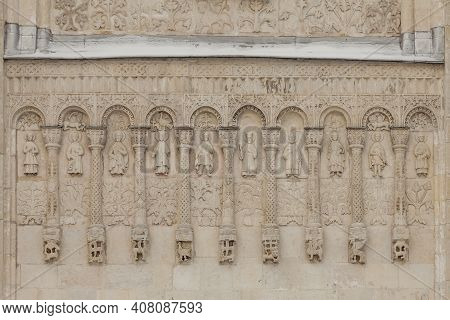Fragment Of The Facade Of An Orthodox Church With Relief Images Of Saints
