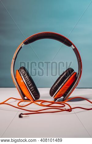 Photo of a Stylish Red Headphones. Music Recording Stuio.