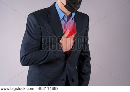 Office Worker With Coronavirus Symptoms On Gray Background