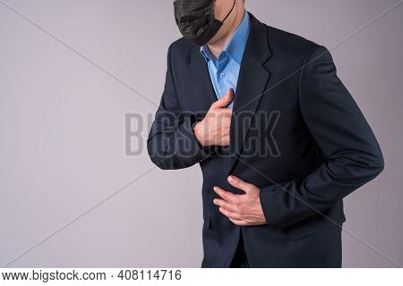 Office Worker With Coronavirus Symptoms On Gray Background