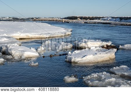 The Mouth Of The Pasnica River Into The Baltic Sea During Winter. Debki, Poland