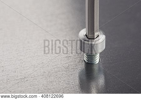 Hex Wrench Screw Hex Bolt In Metal Steel Plate. Spanner, Bolt, Screw And Nuts.