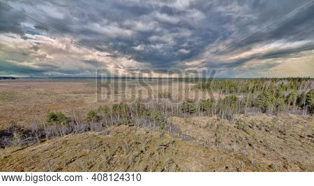 aerial view of northern peat swamp under sky with clowds