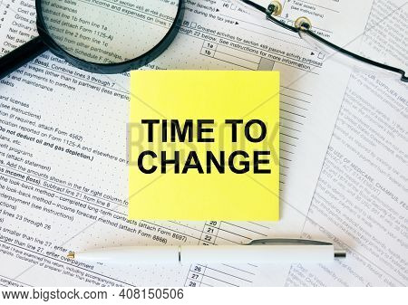 Yellow Sticker With Text Time To Change On Financial Docs