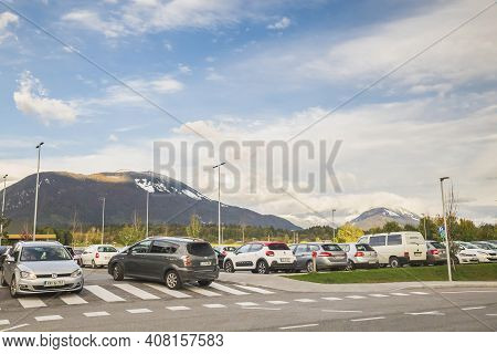 Lesce, Slovenia, October 2020: Car Parking With Views Of The Julian Alps In Slovenia