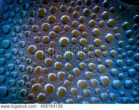 Many Beautiful Colored Fat Bubbles On The Water