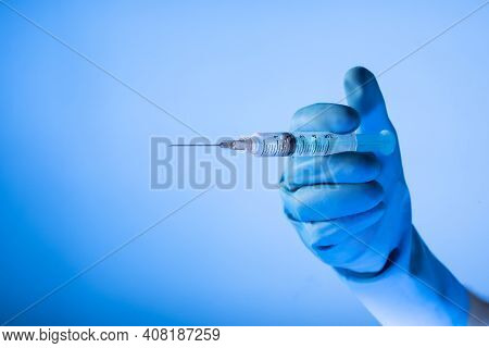 Coronavirus Covid-19 Vaccine. Doctor Filling Medication. Copy Space