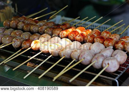 Street Food Thai Sausage Or Esan Sausage Grill On Stove