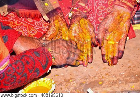 Indian Traditional Wedding Ceremony : Haldi Ceremony, Turmeric Putting In Hand