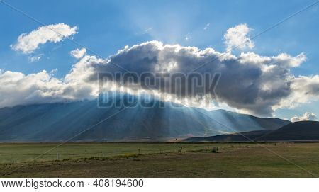 Dramatic mountain landscape near Castelluccio village in National Park Monte Sibillini, Umbria region, Italy
